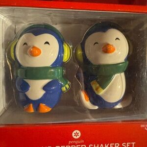 Brand new peguin salt and pepper shakers